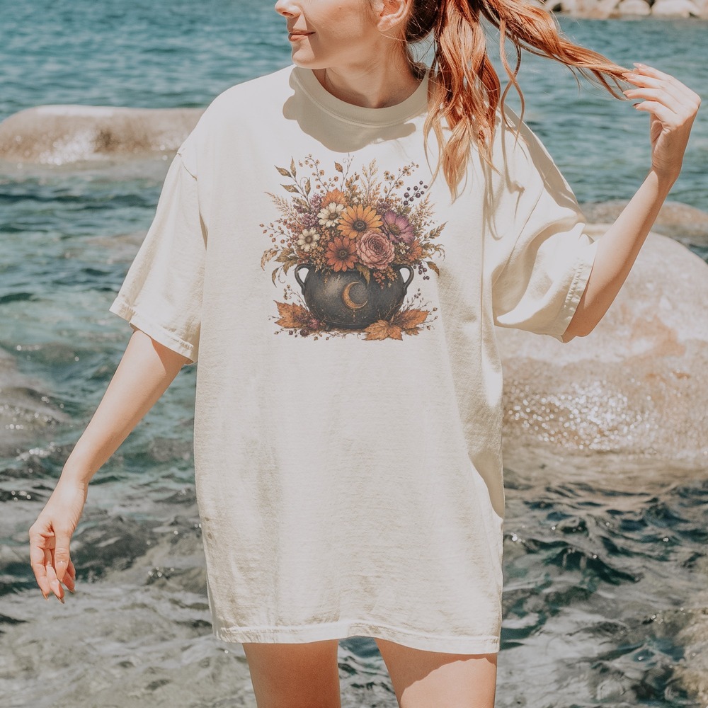 Autumn Bouquet Spilling from a Moon-Marked Cauldron Tee